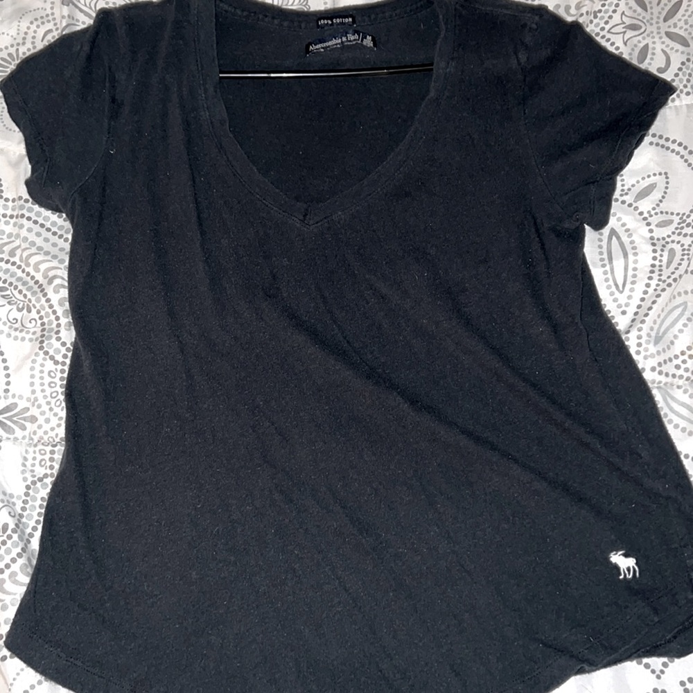 It’s a black short sleeve shirt